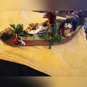 Xmas canoe , 25 inches long, loaded with toys